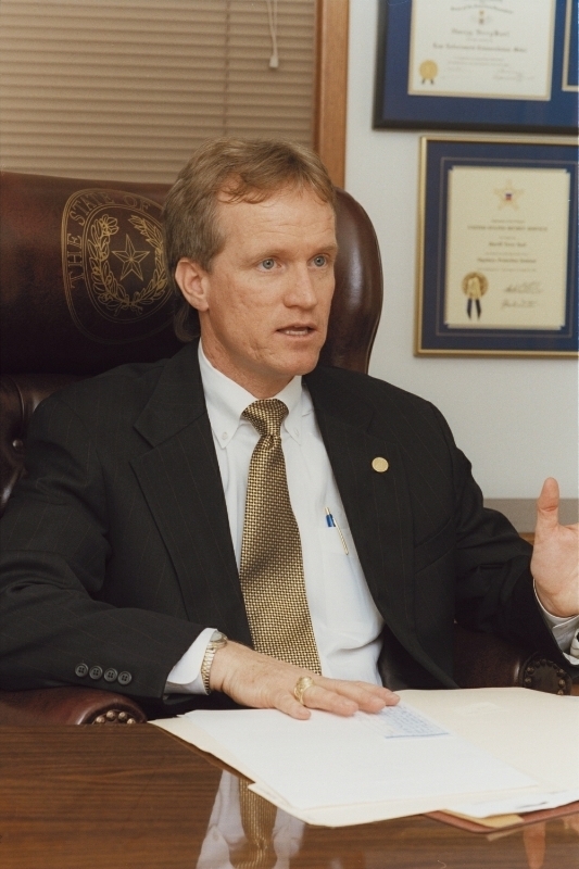 Representative Terry Keel at his office desk, 2002.  Photo courtesy of Terry Keel